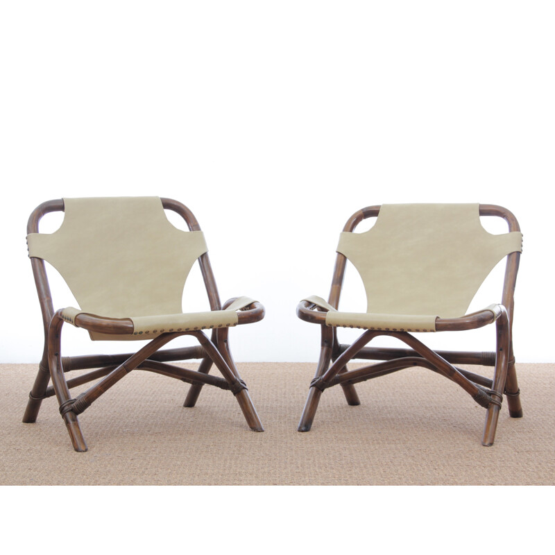Pair of vintage rattan and imitation leather armchairs 