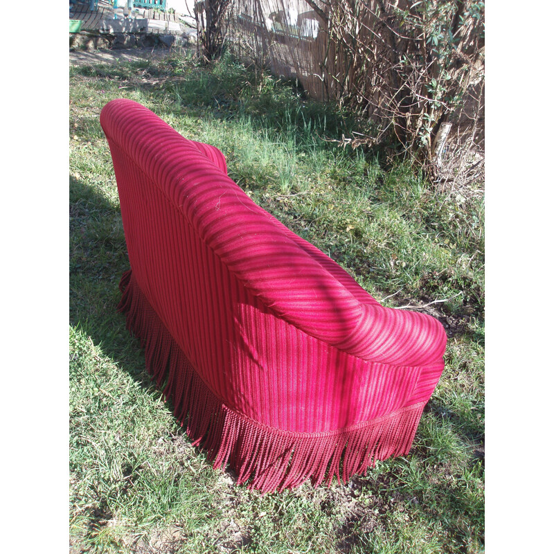 Vintage 2-seater red velvet sofa