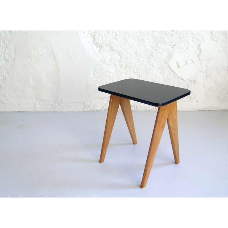 Vintage black lacquered and oak side table