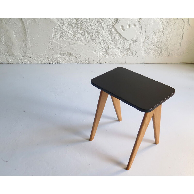 Vintage black lacquered and oak side table