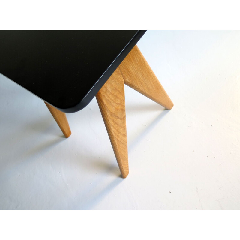 Vintage black lacquered and oak side table