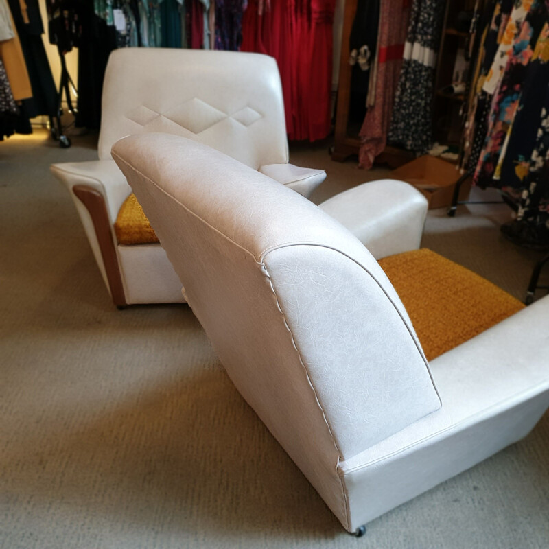 Pair of Vintage cream vinyl armchairs, Britain