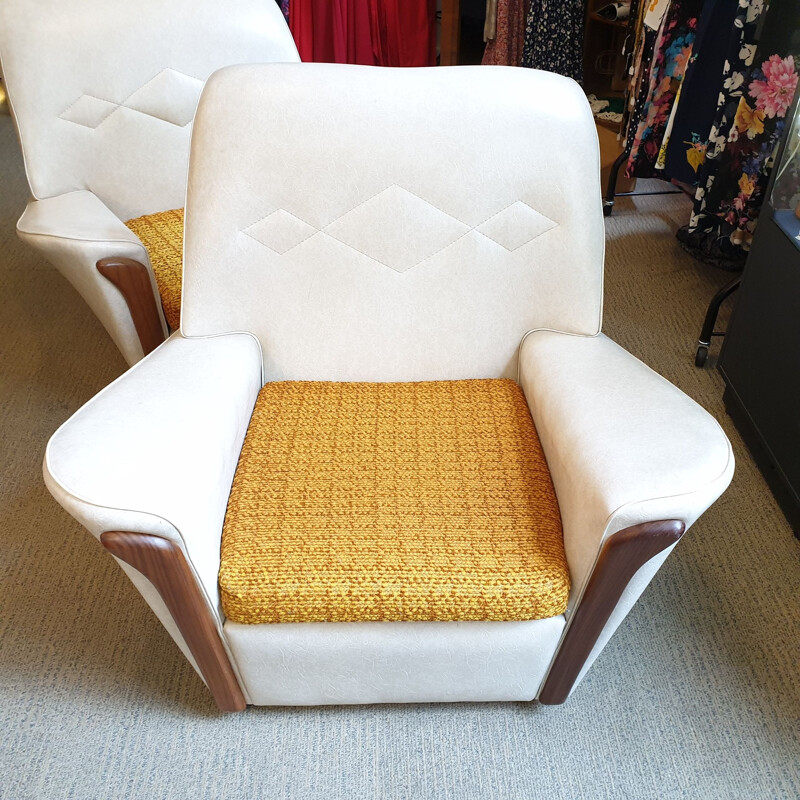 Pair of Vintage cream vinyl armchairs, Britain