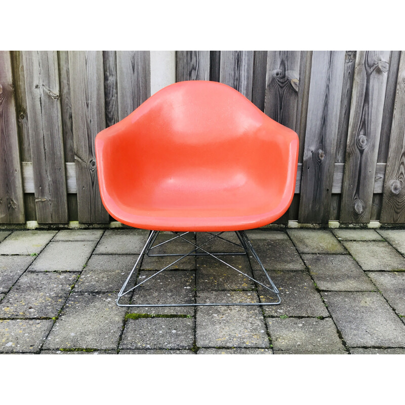 Vintage LAR Fibreglass Chair by Charles & Ray Eames in orange fibreglass. 1970