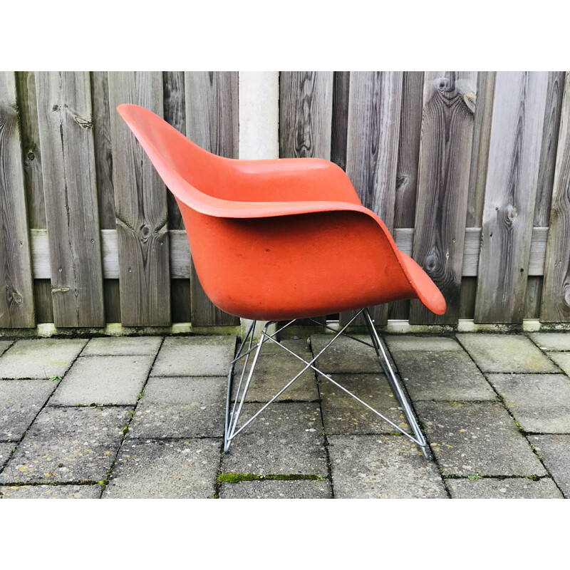 Vintage LAR Fibreglass Chair by Charles & Ray Eames in orange fibreglass. 1970