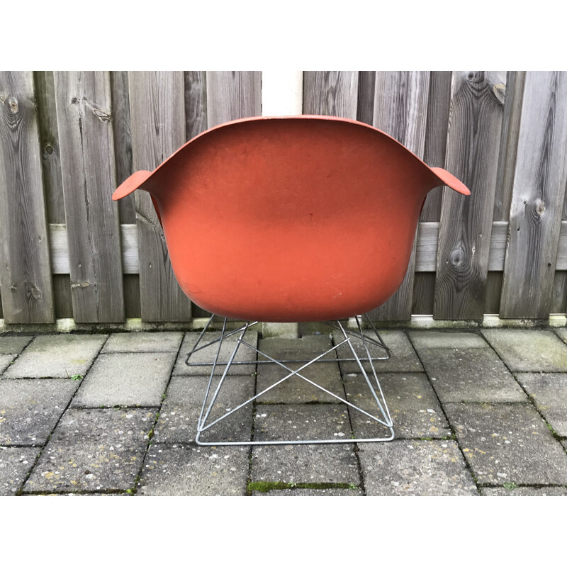 Vintage LAR Fibreglass Chair by Charles & Ray Eames in orange fibreglass. 1970