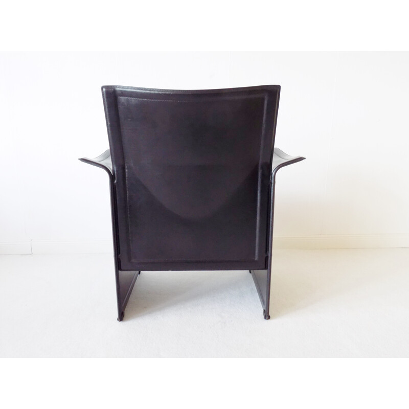 Vintage "Korium" black saddle leather armchair by Tito Agnoli for Matteo Grassi