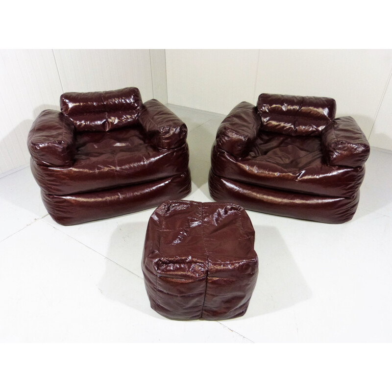 Pair of Italian armchairs and a footrest in darkbrown synthetic fabric - 1980s