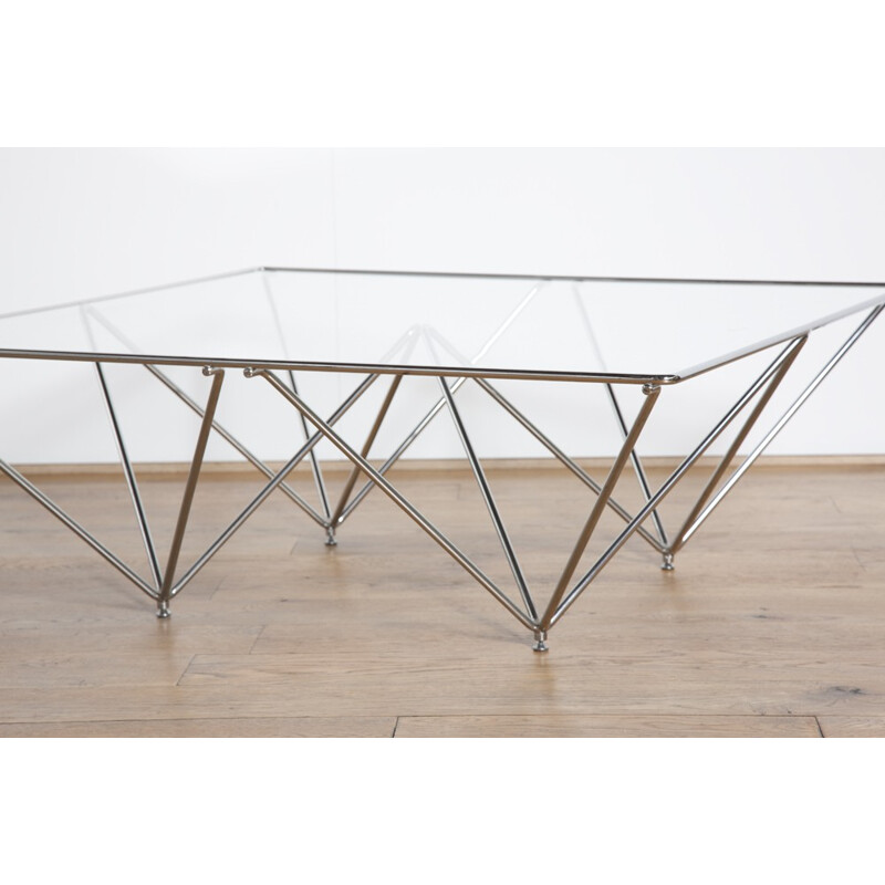 Coffee table with a large clear glass top - 1980s