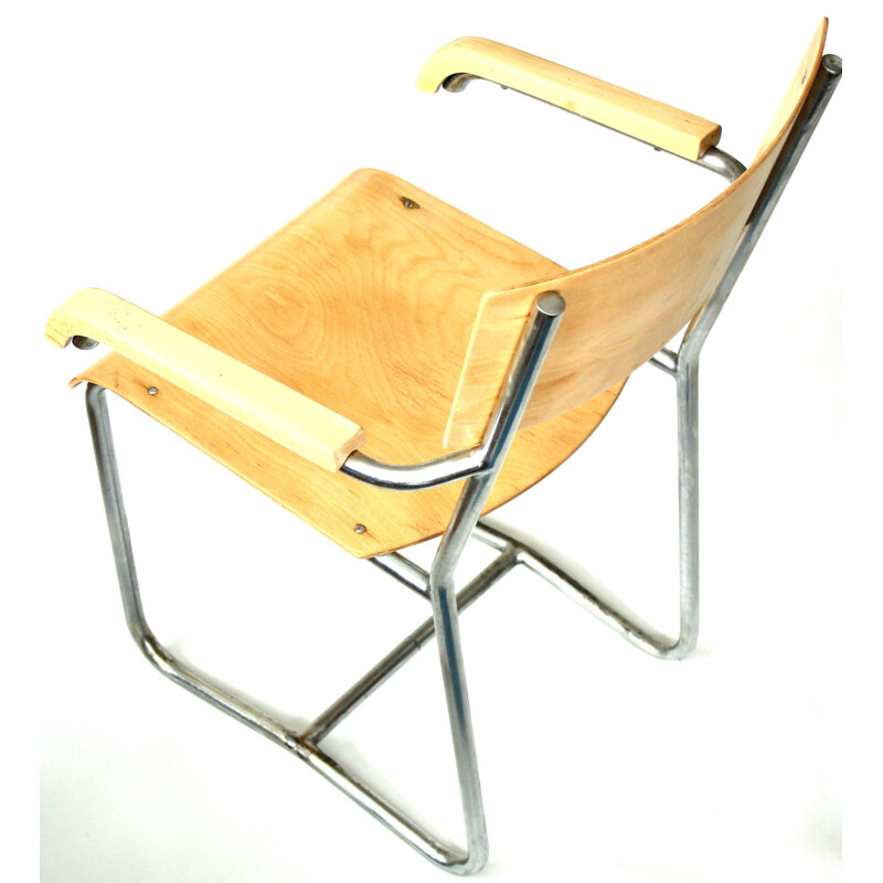 Chaise à bras en bois plaqué et chrome tubulaire - 1960