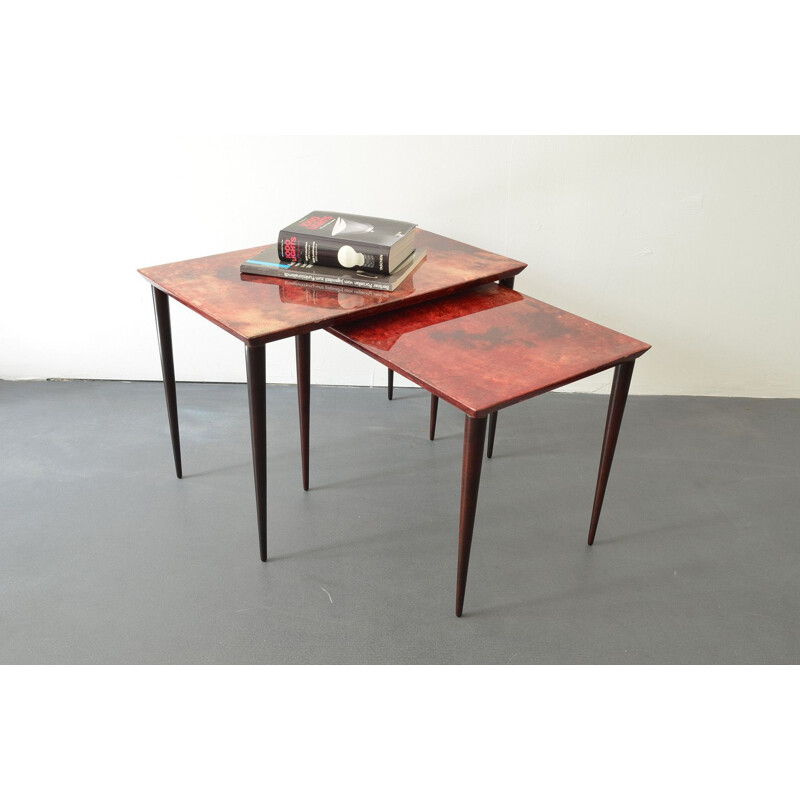 Vintage Red, lacquered Goatskin Nesting Tables by Aldo Tura for Tura Mobili, Italy 1960s. 