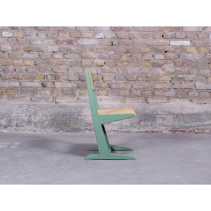 Vintage Cantilever chair in solid wood 1950