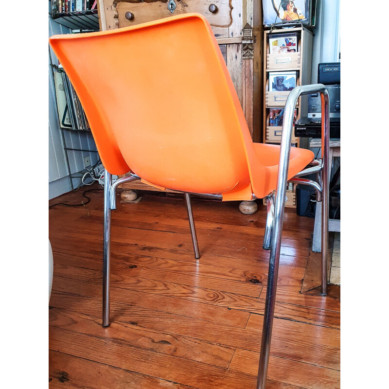 Vintage orange plastic chair 1970