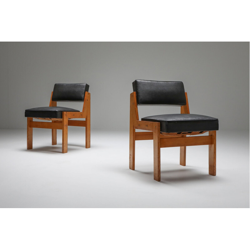 Pair of oak and vinyl armchairs by Wim den Boon, 1950s