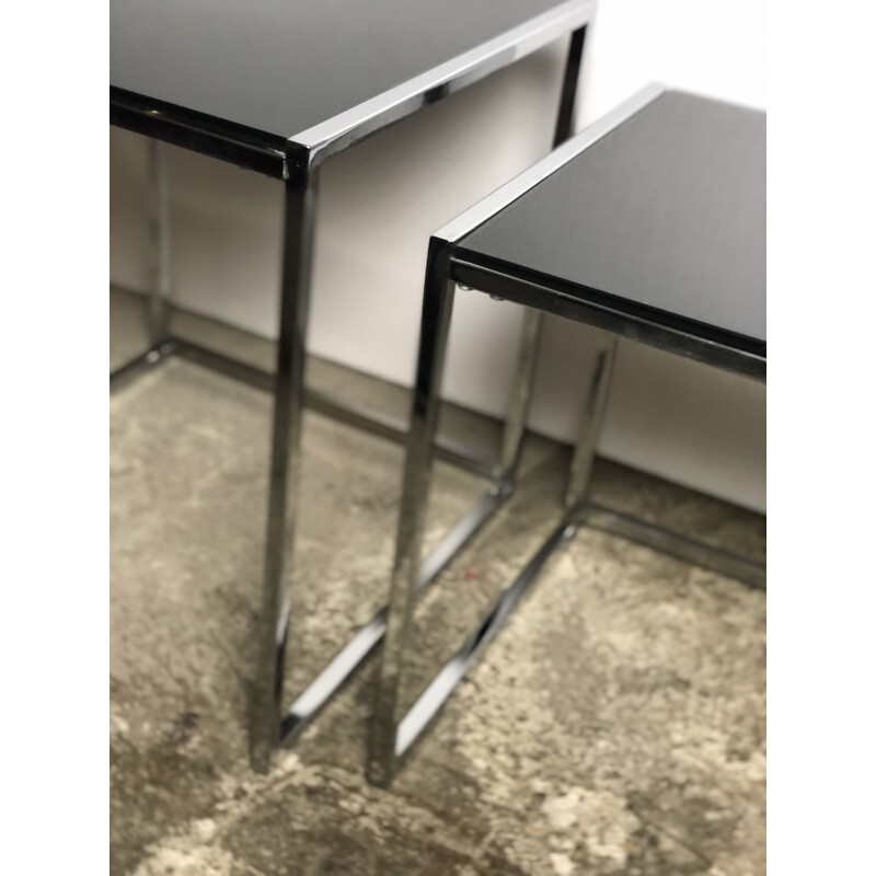 Chrome-plated aluminium nesting tables with black glass top, 1980