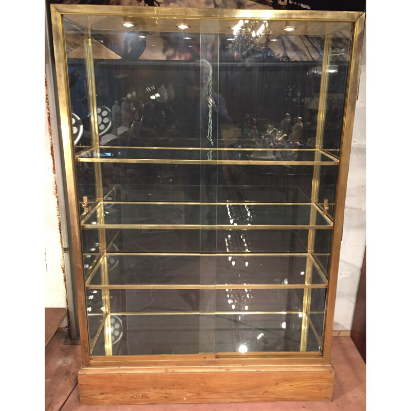 Vintage display case in brass and glass