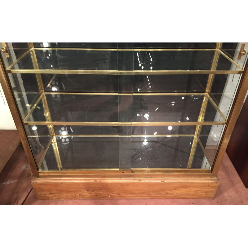 Vintage display case in brass and glass