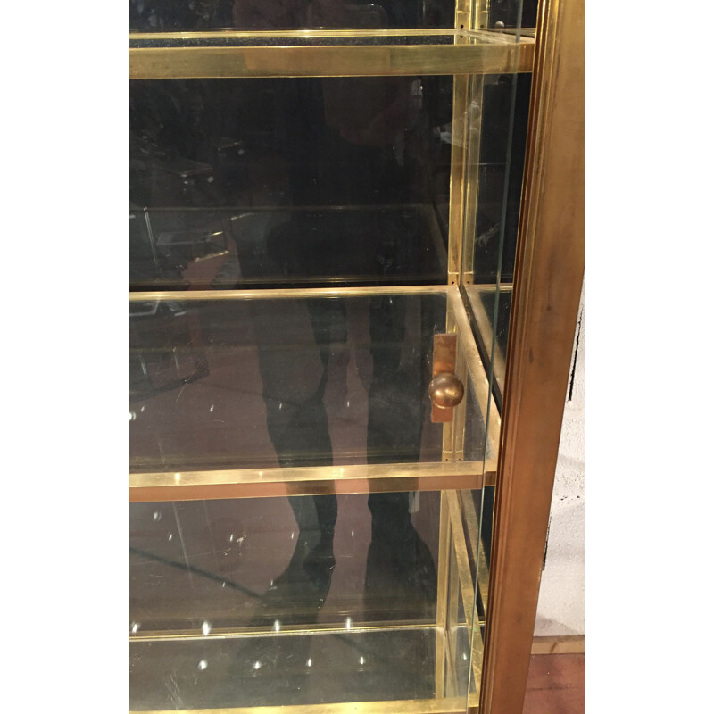 Vintage display case in brass and glass