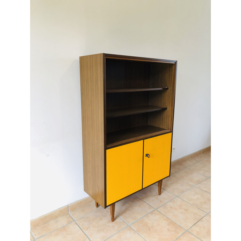 Vintage yellow bookcase, 1970