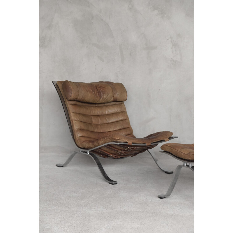 Fauteuil vintage en cuir cognac avec ottoman d'Arne Norell pour Norell AB, 1960