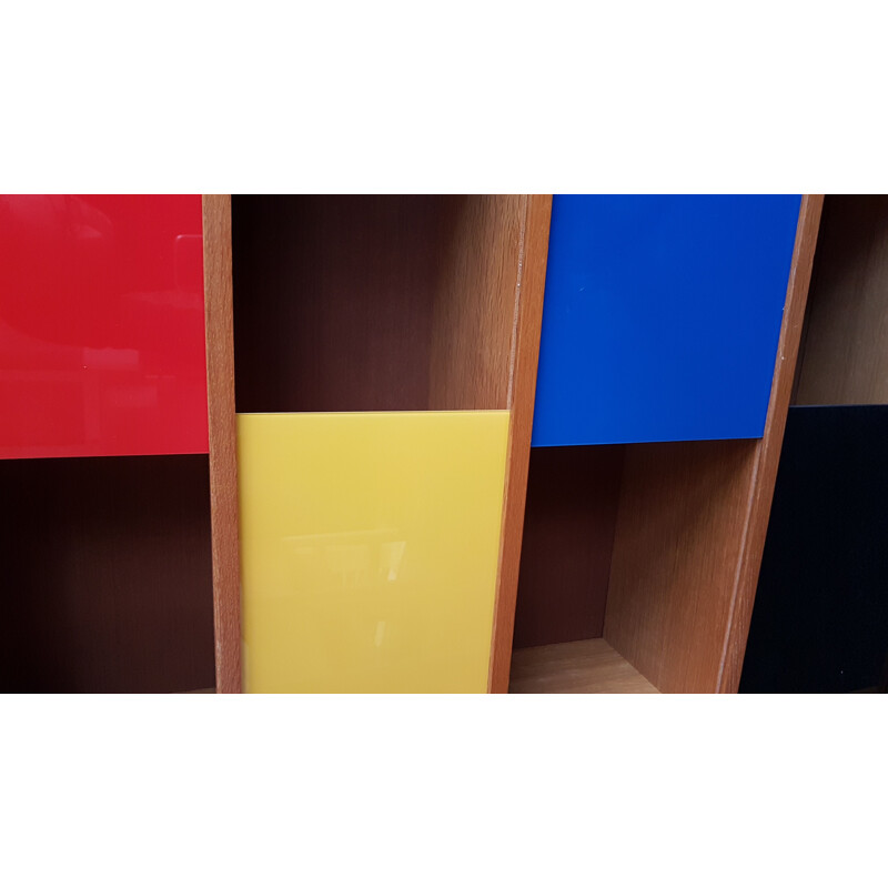 Bookcase with colored sliding windows from the 60's