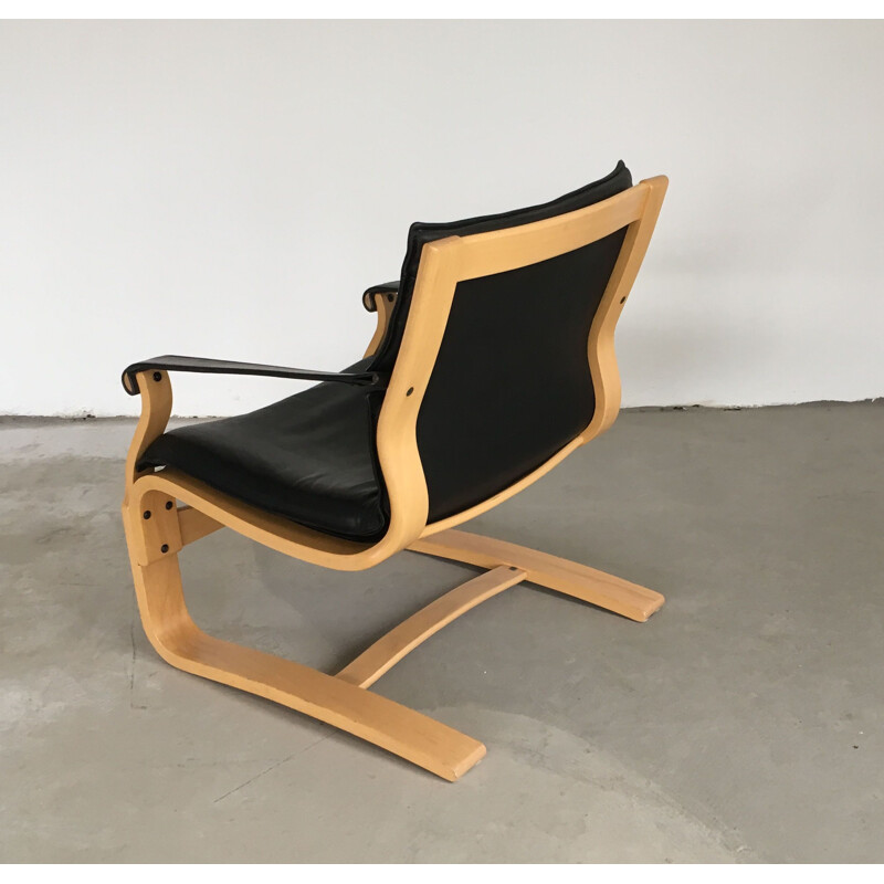 Vintage pair of Ake Fribytter lounge chairs in beech and black leather by Nelo, 1970s