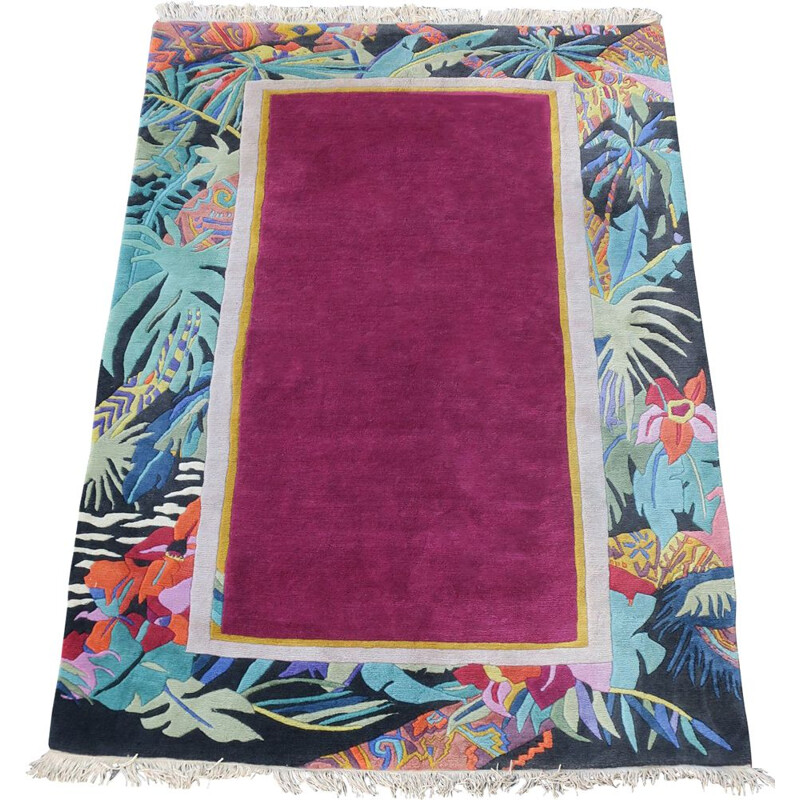 Tapis vintage avec champ uni et bordure stylisée