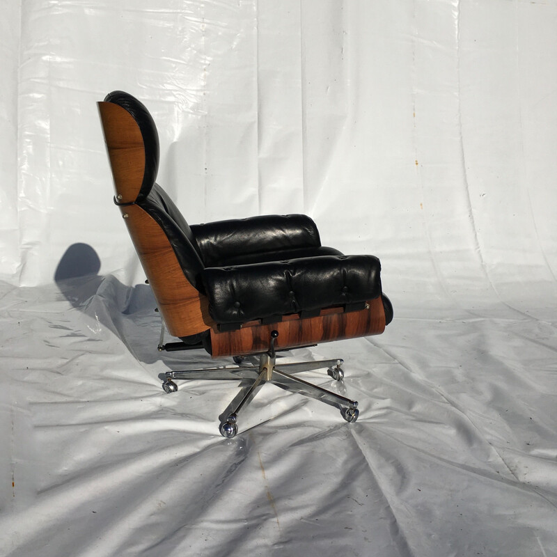 Rosewood leather armchair and ottoman