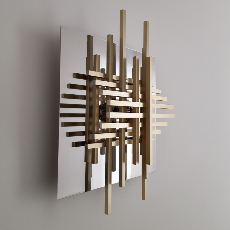 Wall lamp by Philippe Jean  in chrome-plated stainless steel and brass - 1970