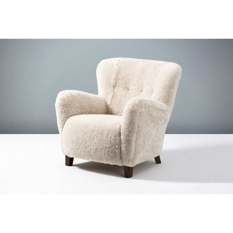 Sheepskin vintage armchair by Fritz Hansen, 1950s