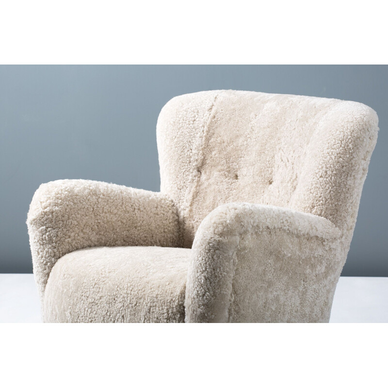 Sheepskin vintage armchair by Fritz Hansen, 1950s