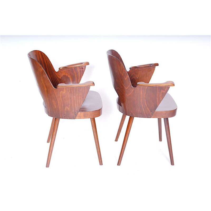 Pair of wooden vintage armchairs by Oswald Haerdtl