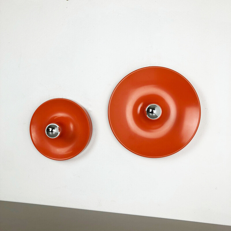 Set of 2 vintage disc-shaped wall sconces, Charlotte Perriand style from the 1970's, by Staff, Germany