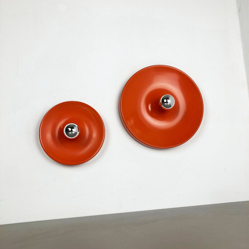 Set of 2 vintage disc-shaped wall sconces, Charlotte Perriand style from the 1970's, by Staff, Germany