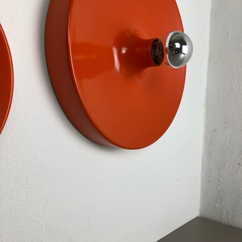 Set of 2 vintage disc-shaped wall sconces, Charlotte Perriand style from the 1970's, by Staff, Germany