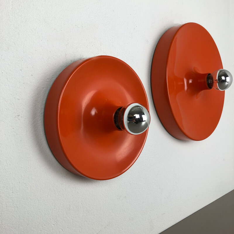 Set of 2 vintage disc-shaped wall sconces, Charlotte Perriand style from the 1970's, by Staff, Germany