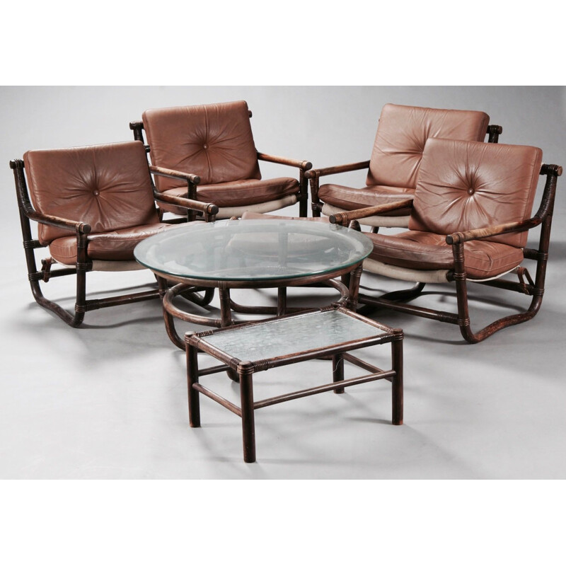 Set of 7 pieces 4 armchairs 1 ottoman 2 coffee tables rattan and leather 1950.