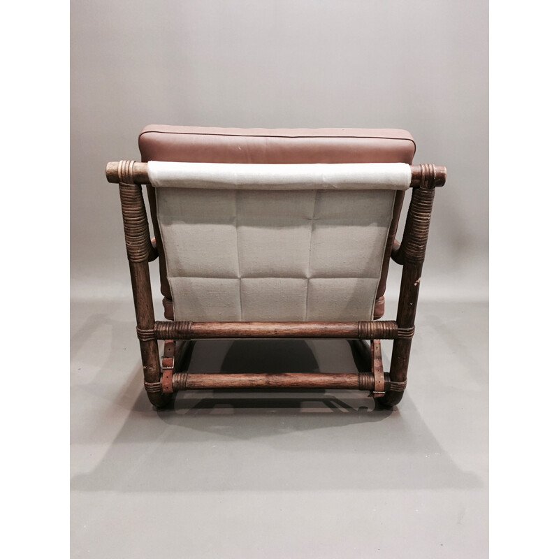 Ensemble de 7 pièces vintage 4 fauteuils 1 ottoman 2 tables basses rotin et cuir 1950.