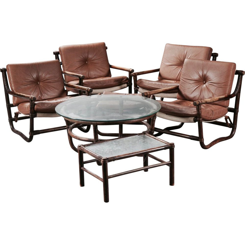 Set of 7 pieces 4 armchairs 1 ottoman 2 coffee tables rattan and leather 1950.