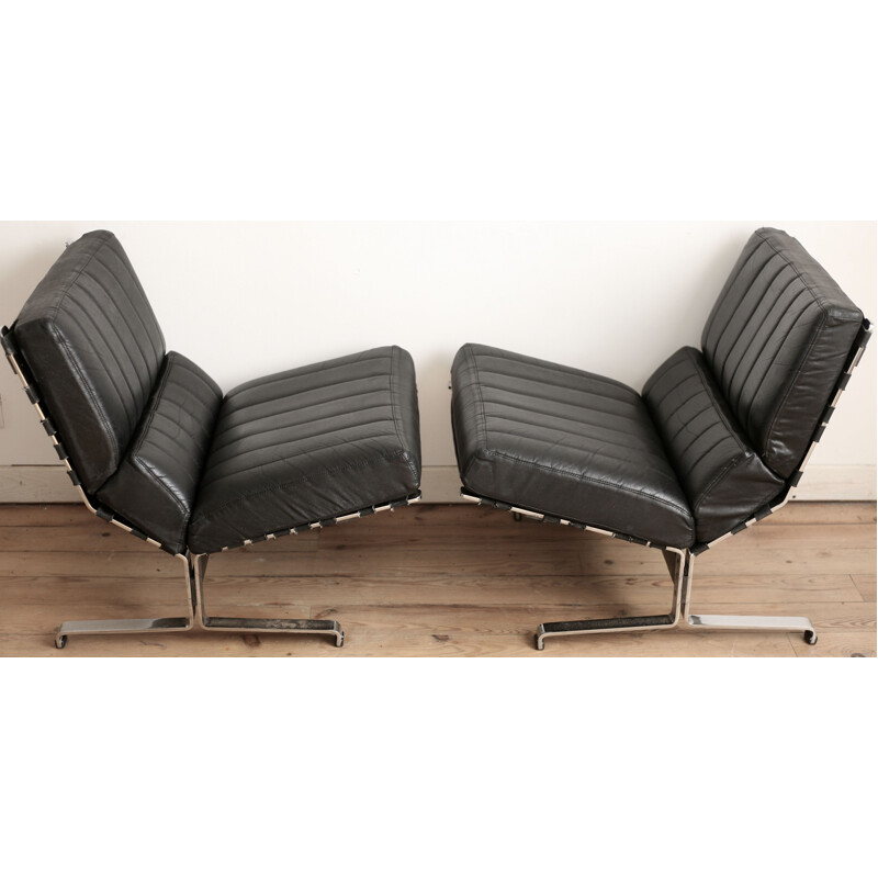 Pair of vintage black leatherette armchairs by Etienne Fermigier, France 1965