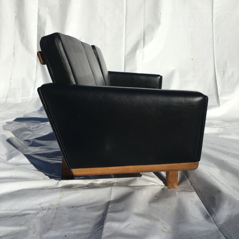 Sofa 3 seater in black leather and oak by Hans Wegner