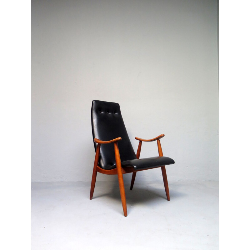 Vintage sculptural armchair in black leatherette, 1950s