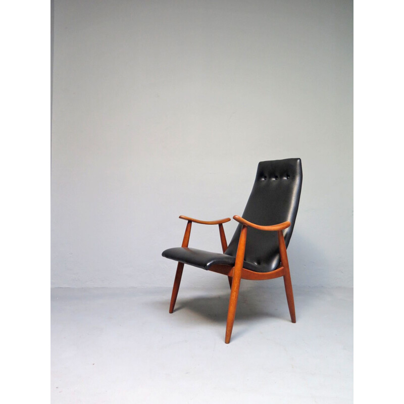 Vintage sculptural armchair in black leatherette, 1950s