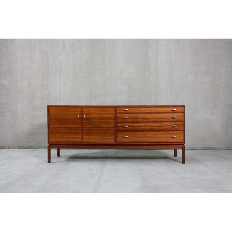  Vintage English sideboard, made from teak and features 1960s