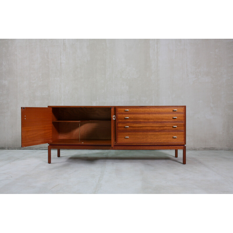  Vintage English sideboard, made from teak and features 1960s