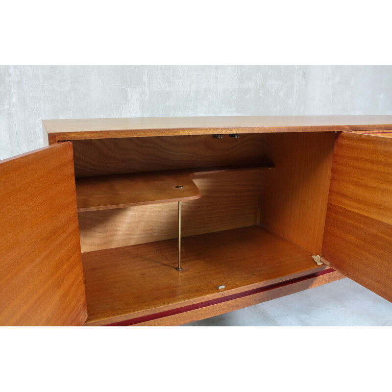  Vintage English sideboard, made from teak and features 1960s