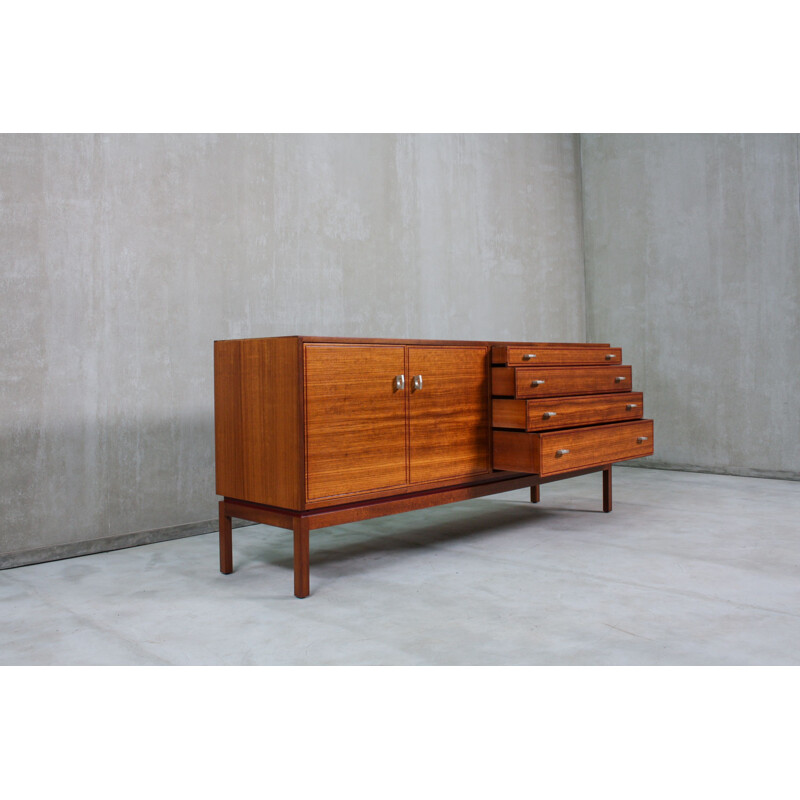  Vintage English sideboard, made from teak and features 1960s