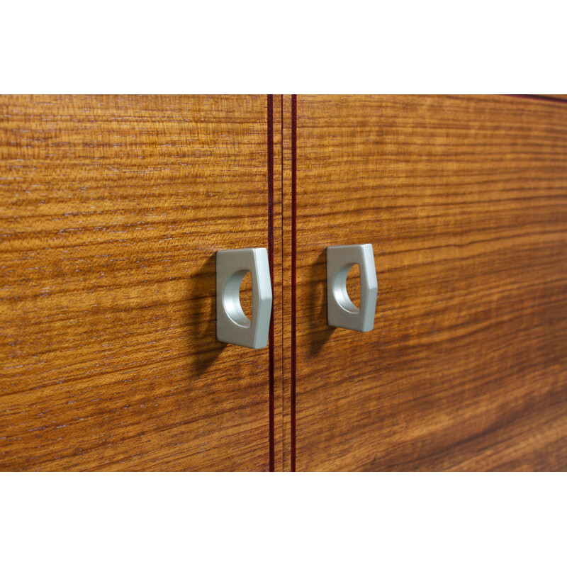  Vintage English sideboard, made from teak and features 1960s