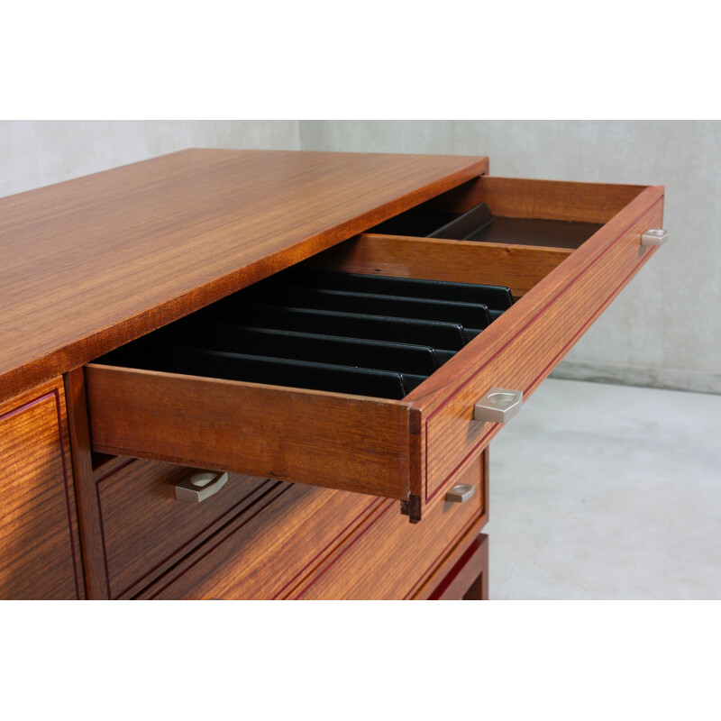  Vintage English sideboard, made from teak and features 1960s