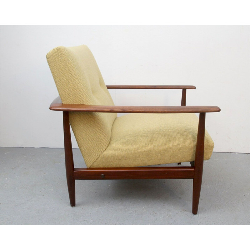 Armchair in dark teakwood  in yellow 1960s